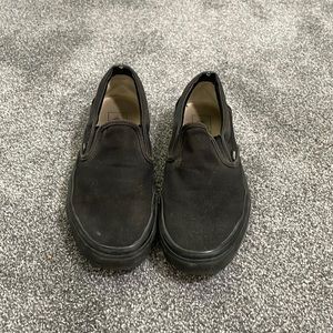 Women’s size 8.5 or men’s size 7 black vans.
